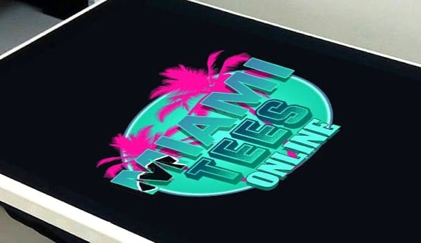 Neon retro gaming logo on custom t-shirt — DTG printing Miami