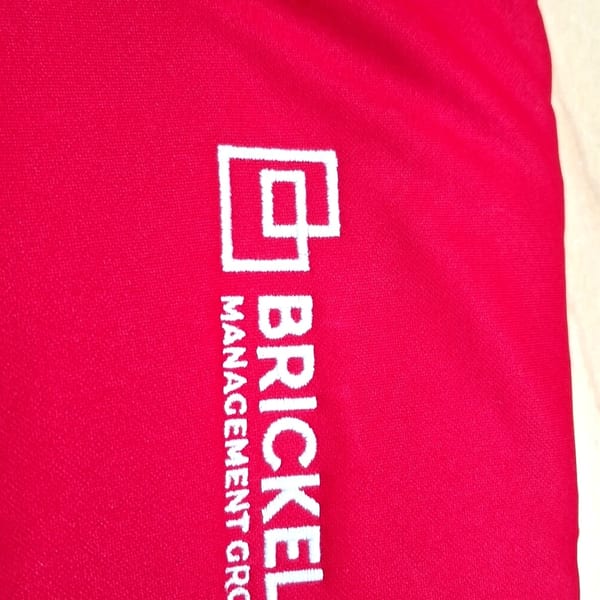 Brickell Management Group logo applied via vinyl heat transfer Miami
