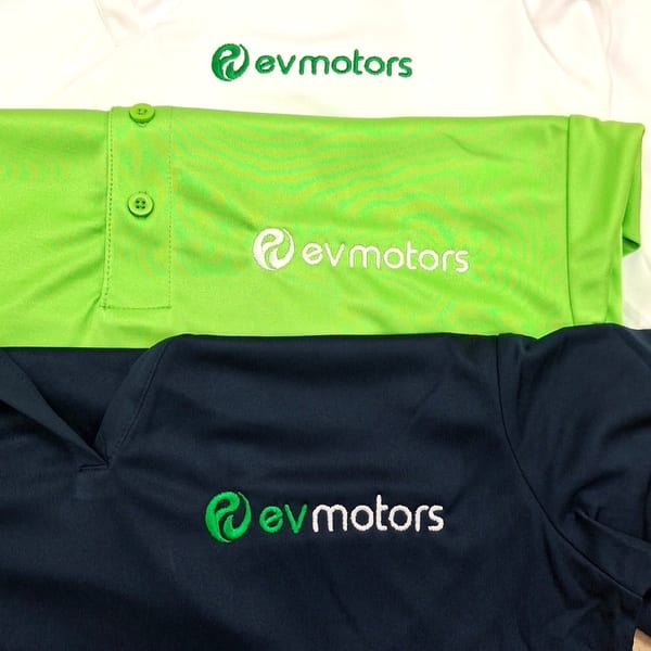 EVMotors branded polo shirts with vinyl heat transfer Miami